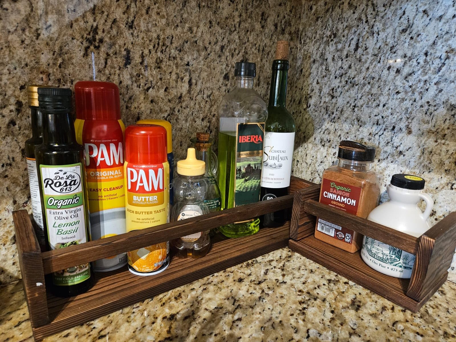 Nursery Shelves for Wall used in the kitchen to organize spices and cooking supplies, showcasing the versatility of the shelf design