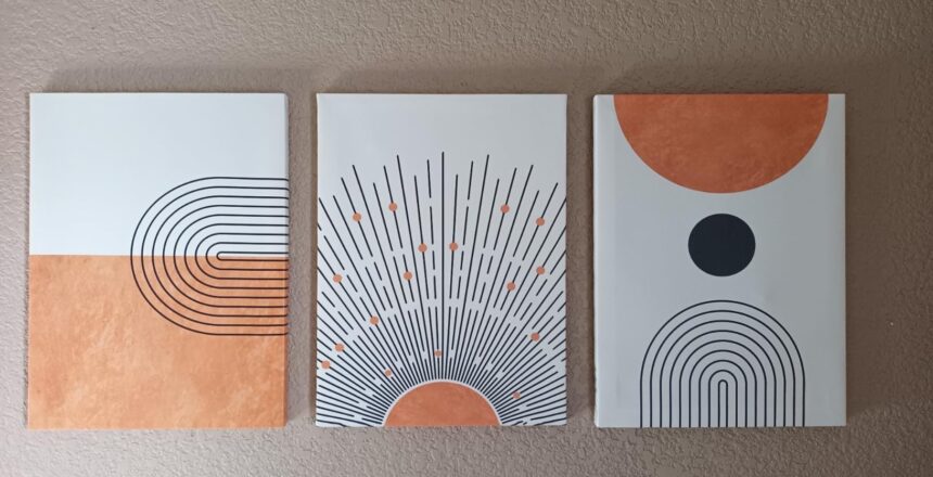 Three-panel boho artwork for wall art featuring minimalist geometric designs in earthy tones. The first panel has curved lines forming a semi-circle, the middle panel showcases sunburst rays with small dots, and the third panel has a circular shape with curved lines below it.