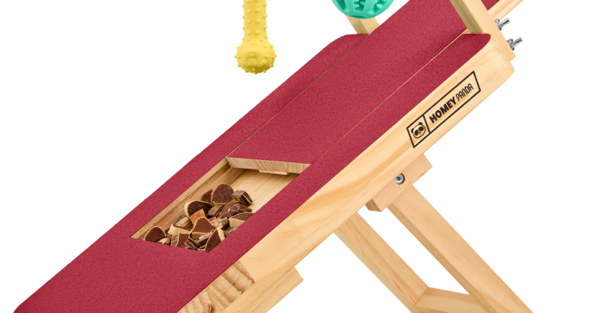 Dog nail scratch board in red color with attached toys and a treat holder, ideal for keeping your dog's nails trimmed naturally.